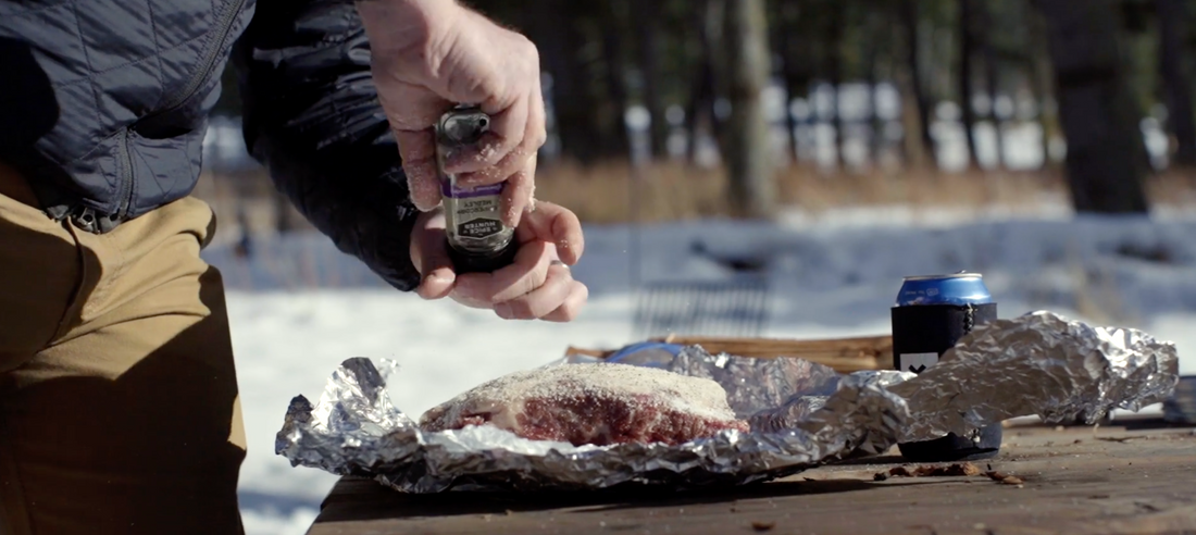 Watch Outside’s Wes Siler Cook Beef Ribs Over a Camp Fire